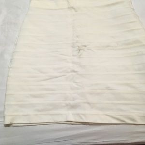 Beige Express skirt with slight dark stain